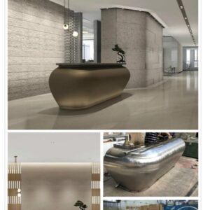 Curved metal reception counter shown during fabrication and in a finished interior