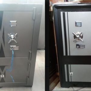 Two grey and black cabinet safety boxes with wheel-style handles