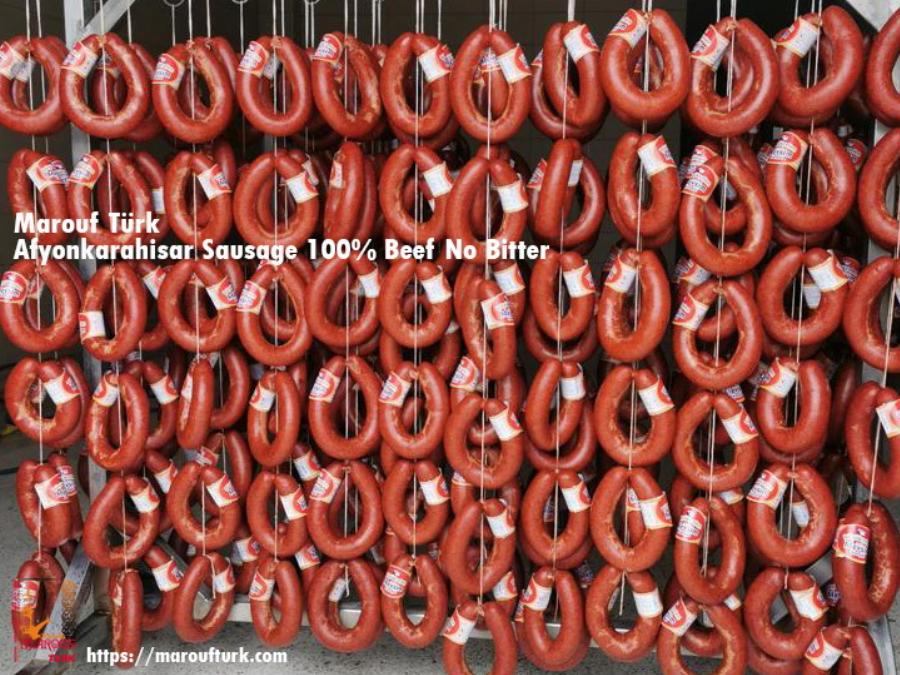 Büyükçelen beef sausage rings hanging in a display